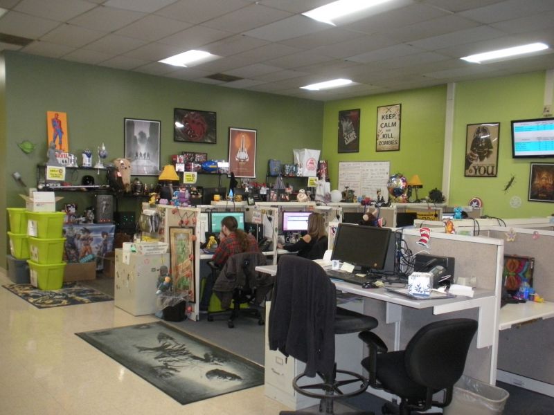 One of the call center areas with cubicles, chairs, computers and phones at American Customer Care Montoursville